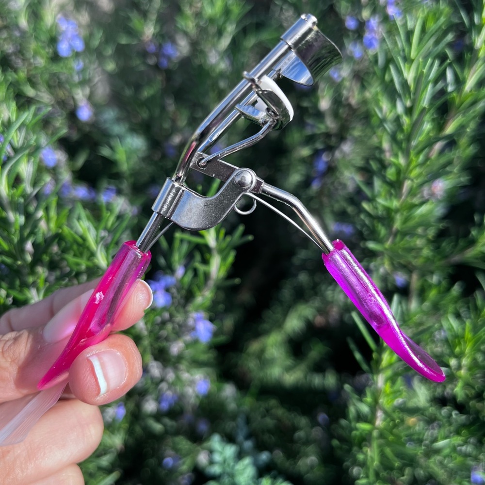 Lash curler in pink blue or purple with extra lash protector FREE W/$50 purchase